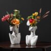 1481e0e9-b6ed-4558-88d5-29345973721a.jpg White Ceramic Bust Vase — Male or Female