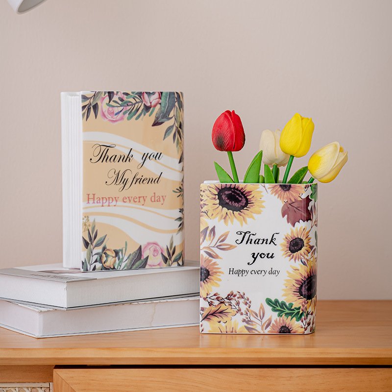 Book-shaped floral vases for shelf styling