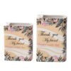 Small and large floral book vases