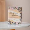Small floral ceramic book vase