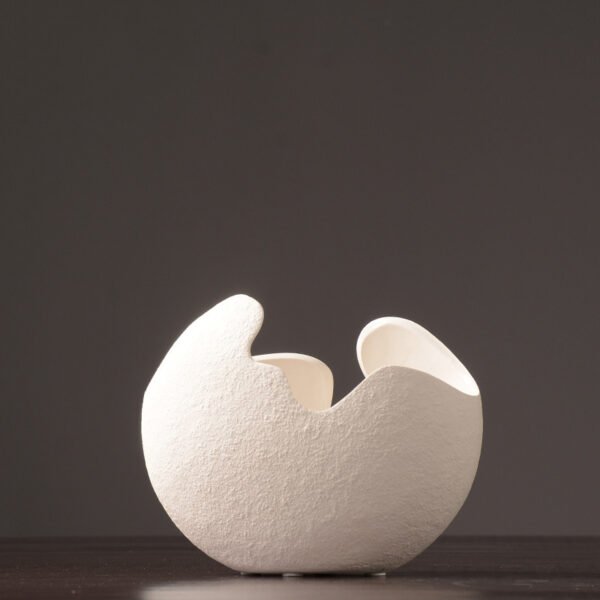 Small sculptural white ceramic vase