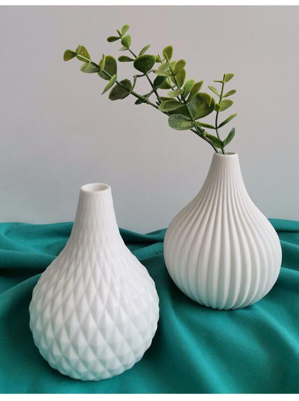 aa54af02-7a98-4371-b24c-31edc4c4913f.jpg Small White Ceramic Vase — Textured Patterns