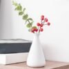 e1624e46-540f-4bbf-a9cf-abee325978d6.jpg Small White Ceramic Vase — Textured Patterns